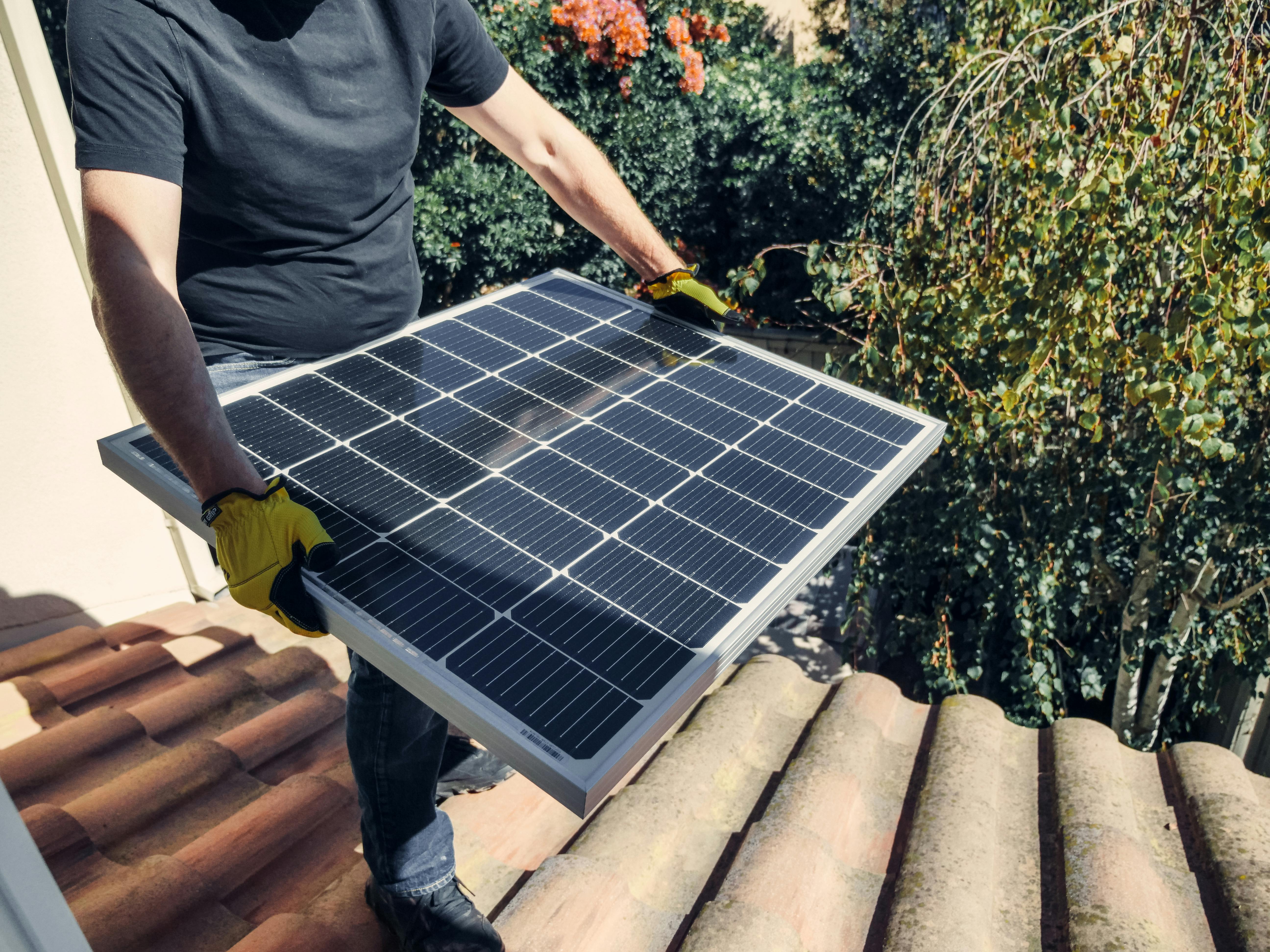 Carrying a solar panel